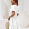 Women's Flowy Casual Mini Dresses 2025 Summer Graduation Smocked V Neck Vacation Dress Dress with Pockets